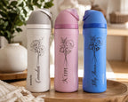 May include: Three Owala water bottles in white, pink, and blue, each featuring a black floral line art design and a personalized name in script font. The bottles have a matching colored lid with a carry loop and the Owala brand name printed.